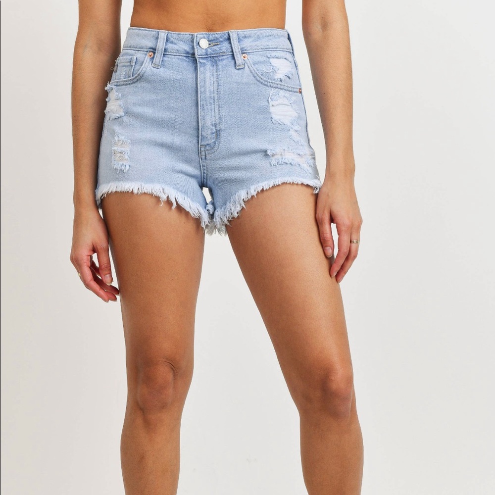 High rise distressed hi-lo denim shorts